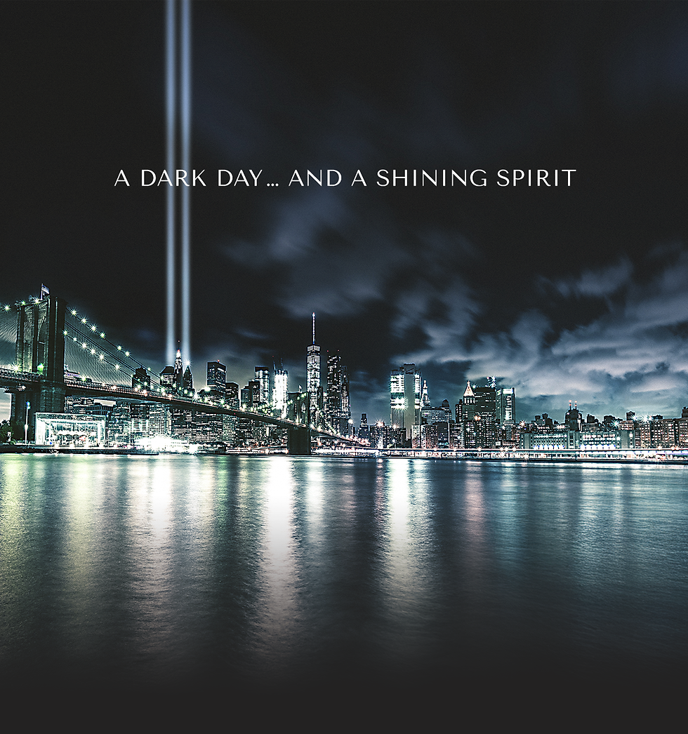 The New York City nighttime skyline with twin light beacons at ground zero. In white text, A Dark Day ... and a Shining Spirit appears over the cloudy sky.